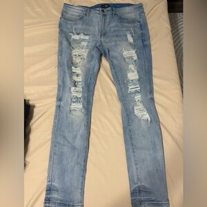 Fashion Nova Sky Blue Ripped Skinny Jeans